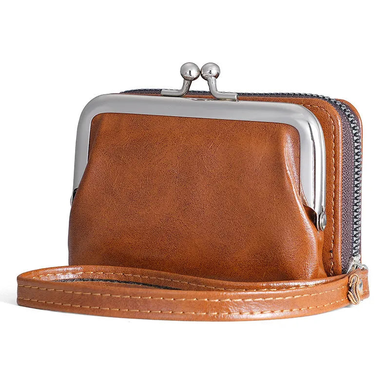 Ladies coin purse with a metal buckle and a long silver clip, shown in a selection of colours.