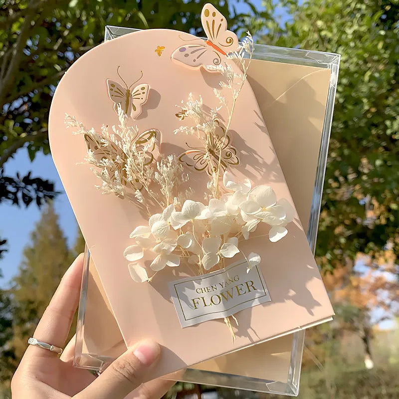 Handmade 3D boxed birthday card with butterfly shape and artificial flowers