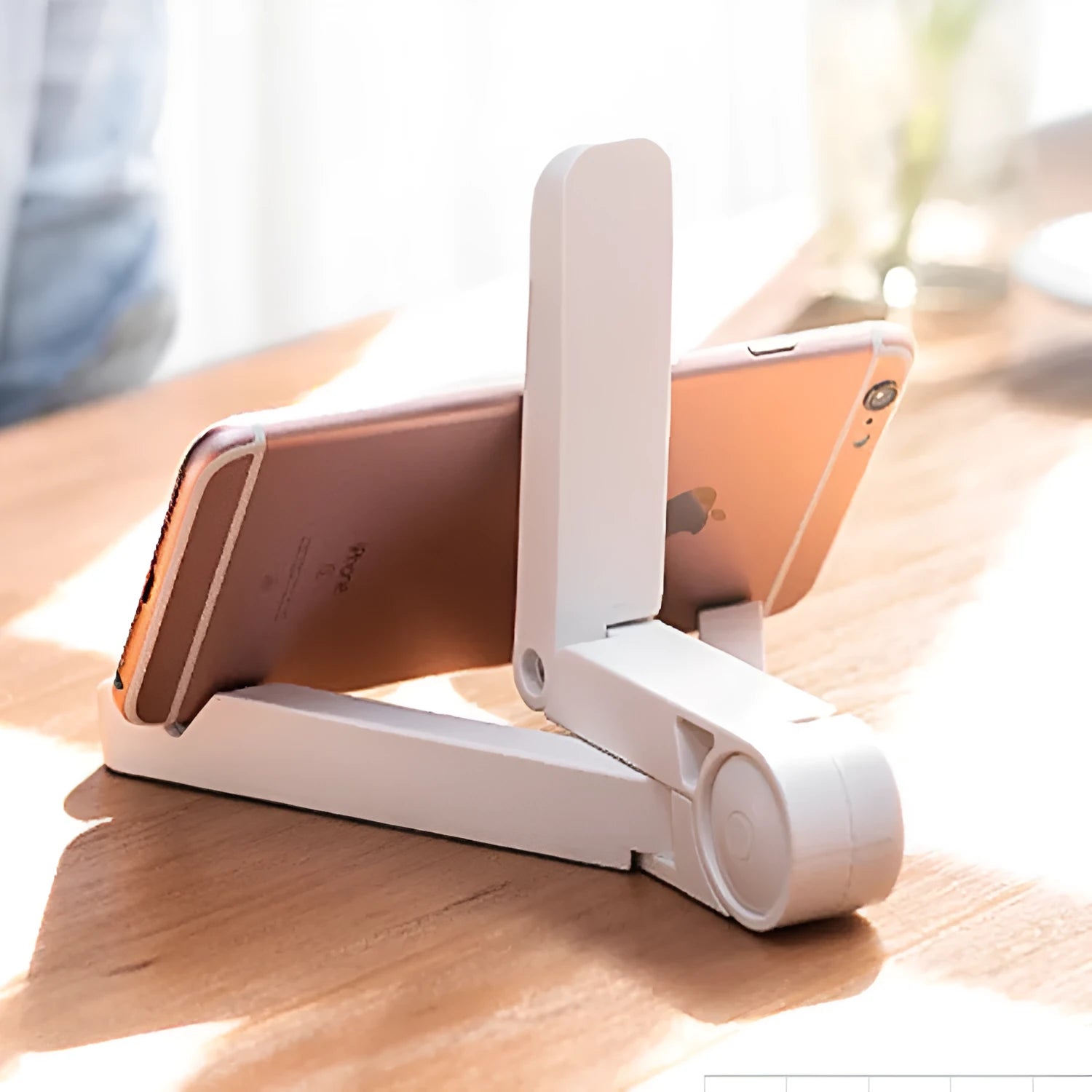 Black foldable tablet holder showing folded size and non-slip rubber surface for device protection