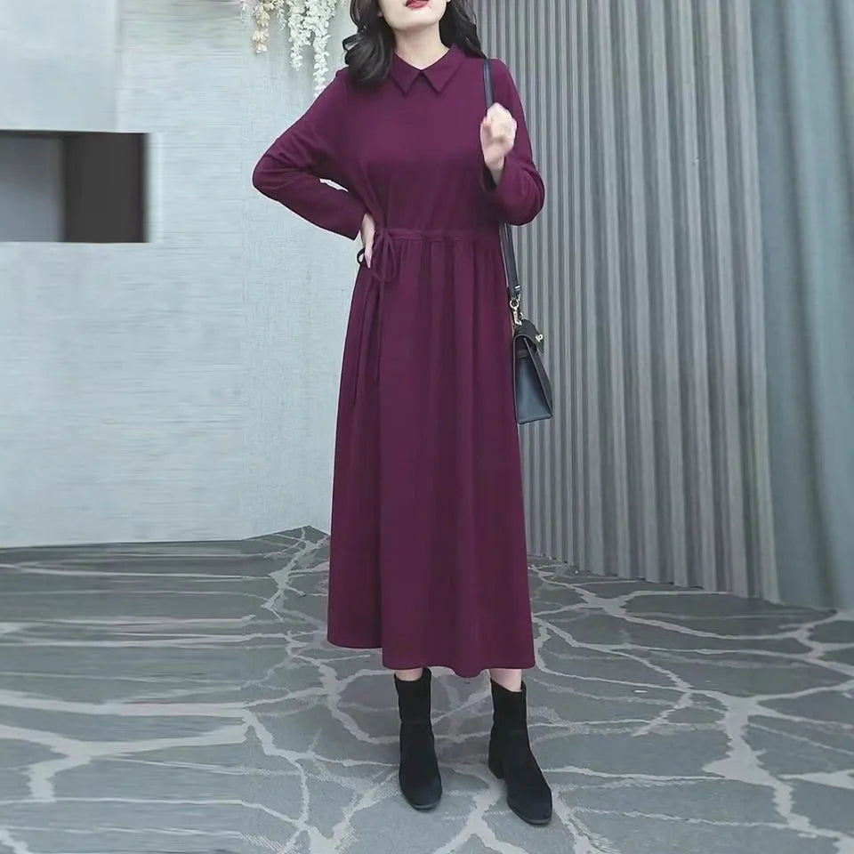 A purplish red plus size long dress with long sleeves for women in autumn and winter.