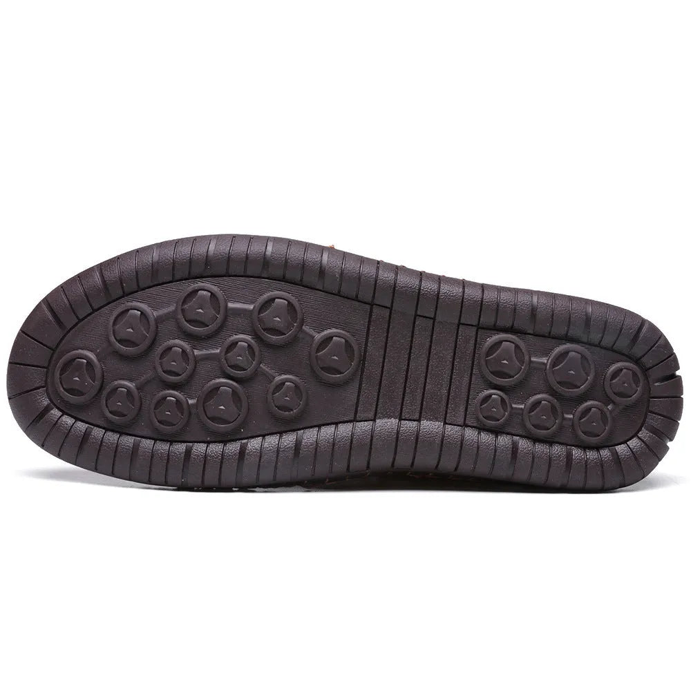Men's brown cowhide leather high-top boots with rubber sole and front laces on a white background.