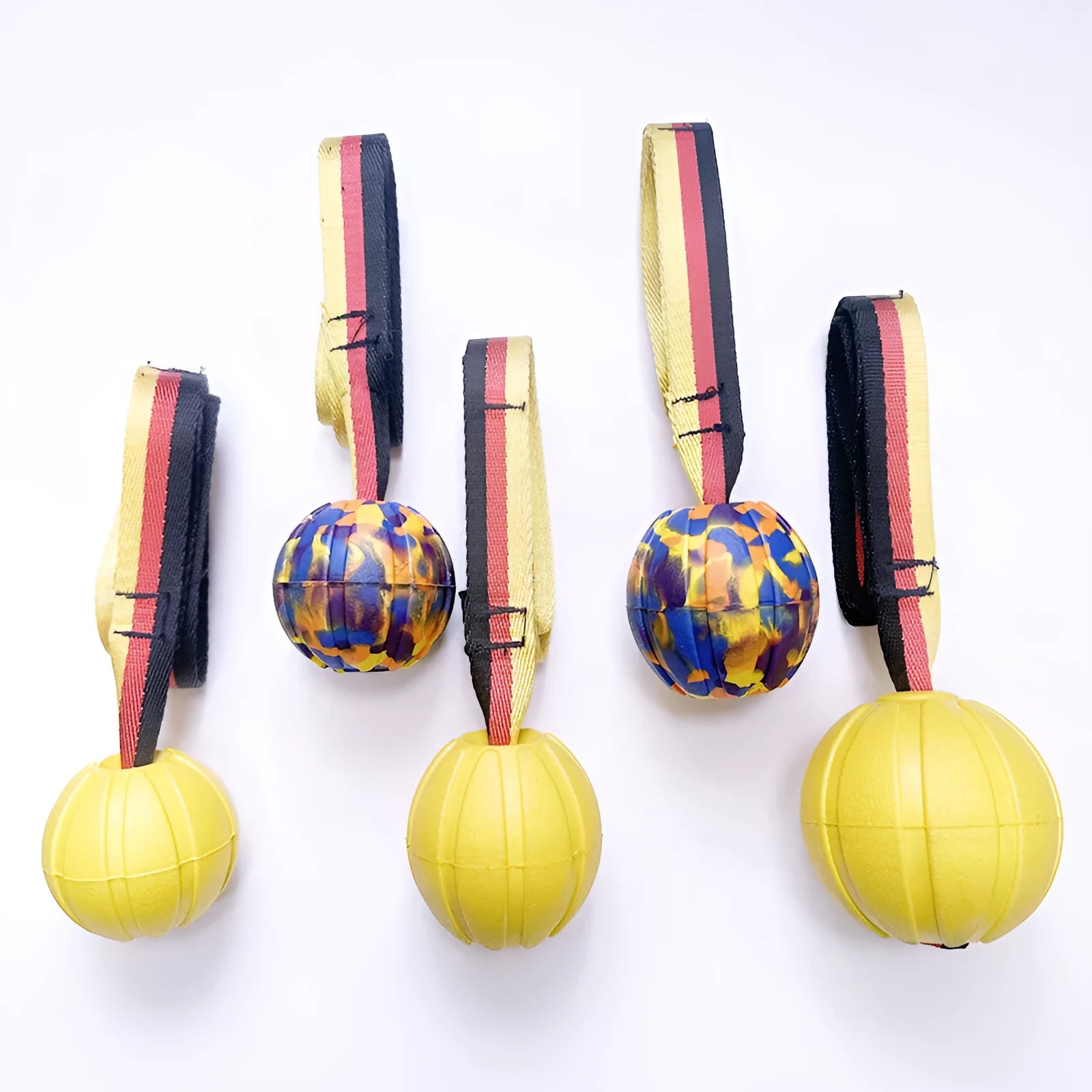 EVA floating knot ball for dog water training in camouflage and yellow colours with tether attachment