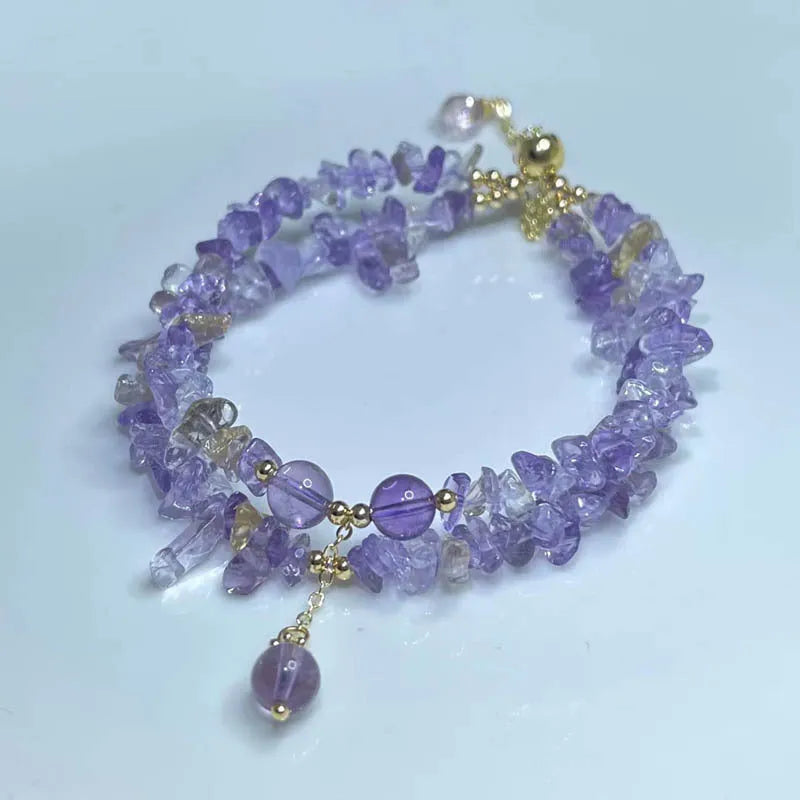 Close-up of a double-row natural ametrine gravel bracelet in D178 colour on a wrist.