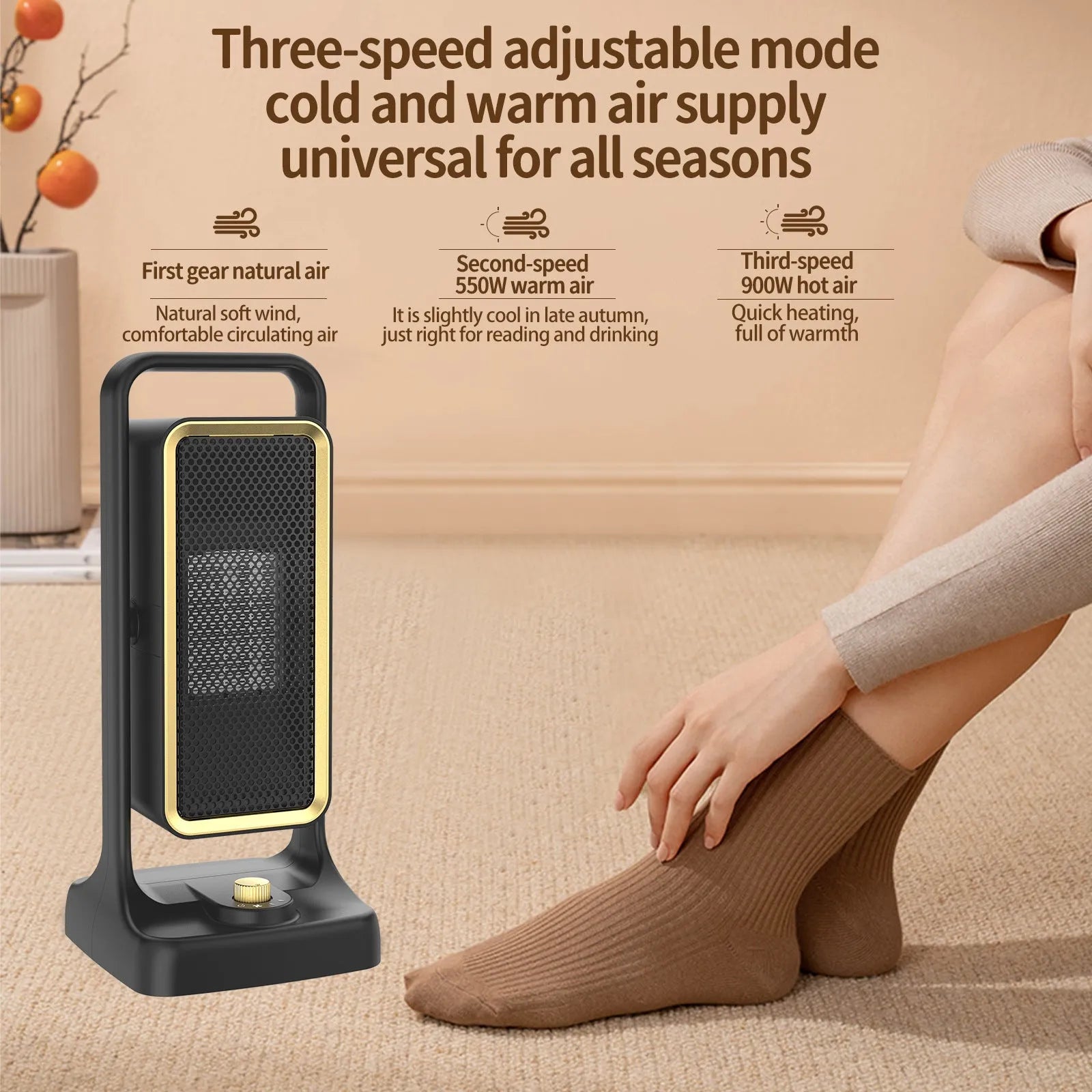 Black compact PTC ceramic desktop air heater with control knob on a wooden desk.
