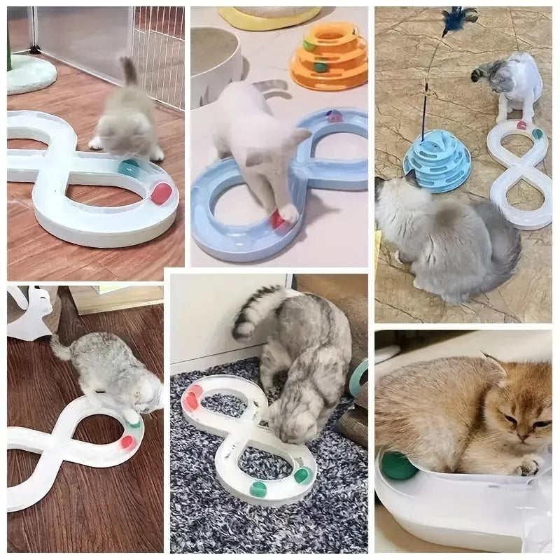 Blue and white plastic cat turntable track toy with balls and a feather teaser wand.