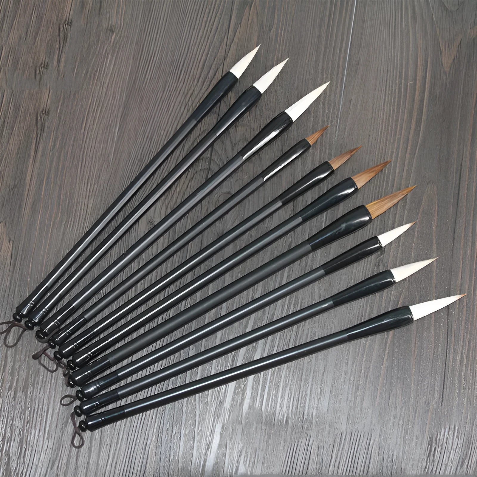 Student calligraphy brush with steel handle, showing kanhao nib and natural hair bristle options.