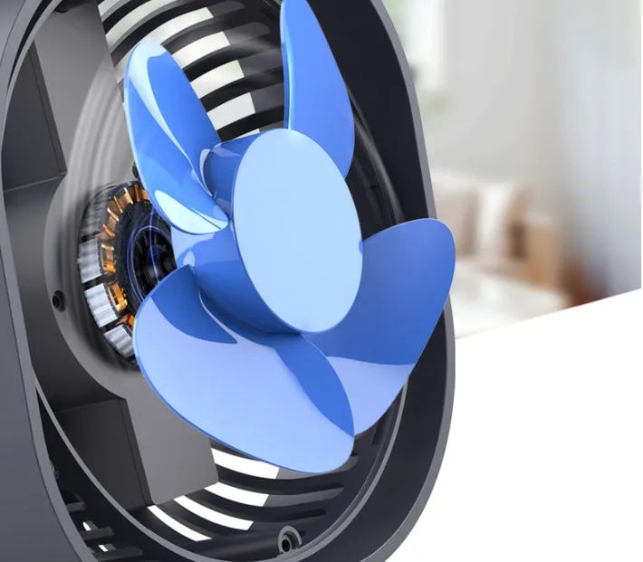 Blue USB desk fan with alarm clock display and plastic blades on a white desk.
