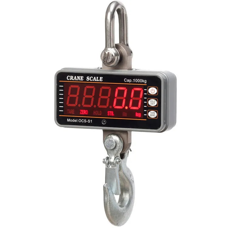 Orange electronic crane scale with digital display, shown suspended for industrial weighing.