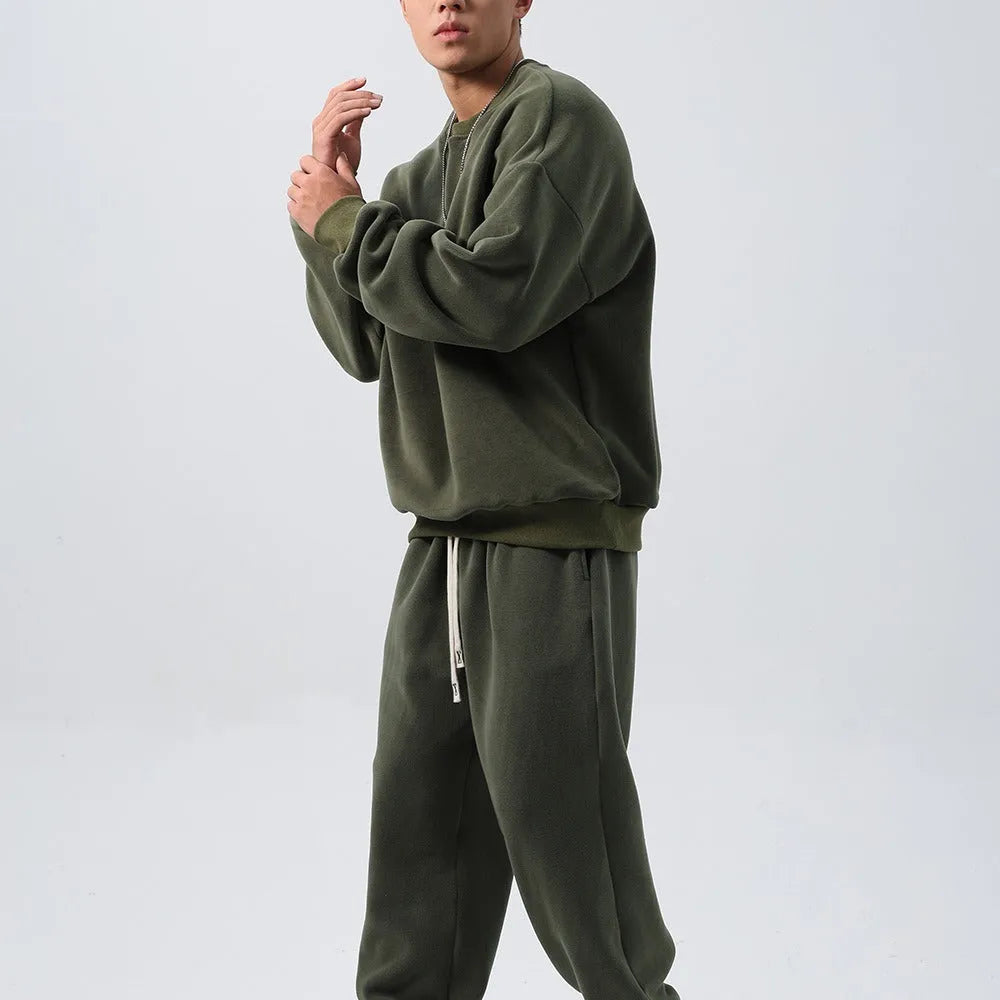 Men's polar fleece sports suit with loose long sleeve coat and matching trousers in winter colours