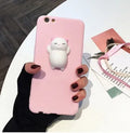 Close-up of a soft silicone iPhone case with a 3D cartoon cat design.