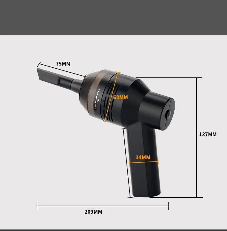 Black desktop mini vacuum cleaner with USB cable and dust collection chamber for keyboard and small space cleaning