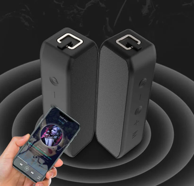 Black waterproof wireless Bluetooth speaker with control buttons and 20W output