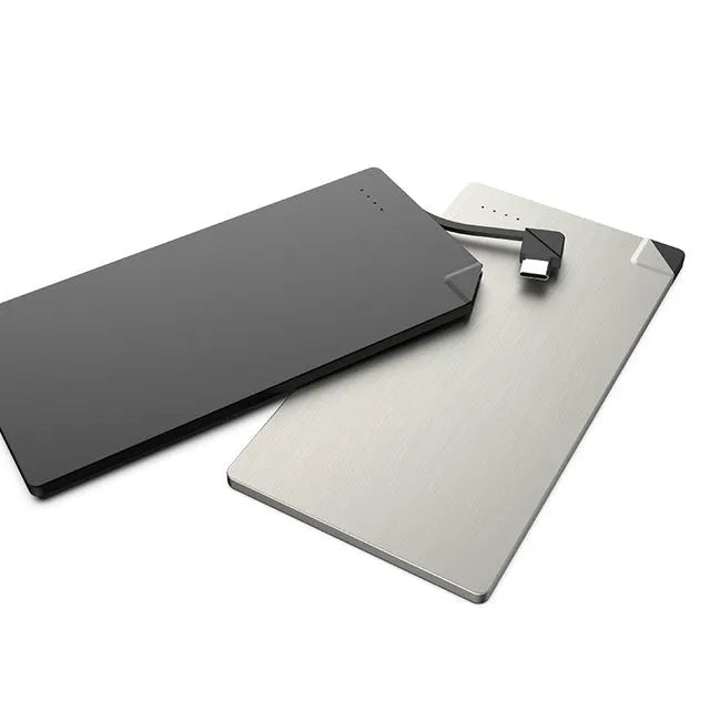 Silver aluminium graphene power bank showing slim 4mm profile with charging ports