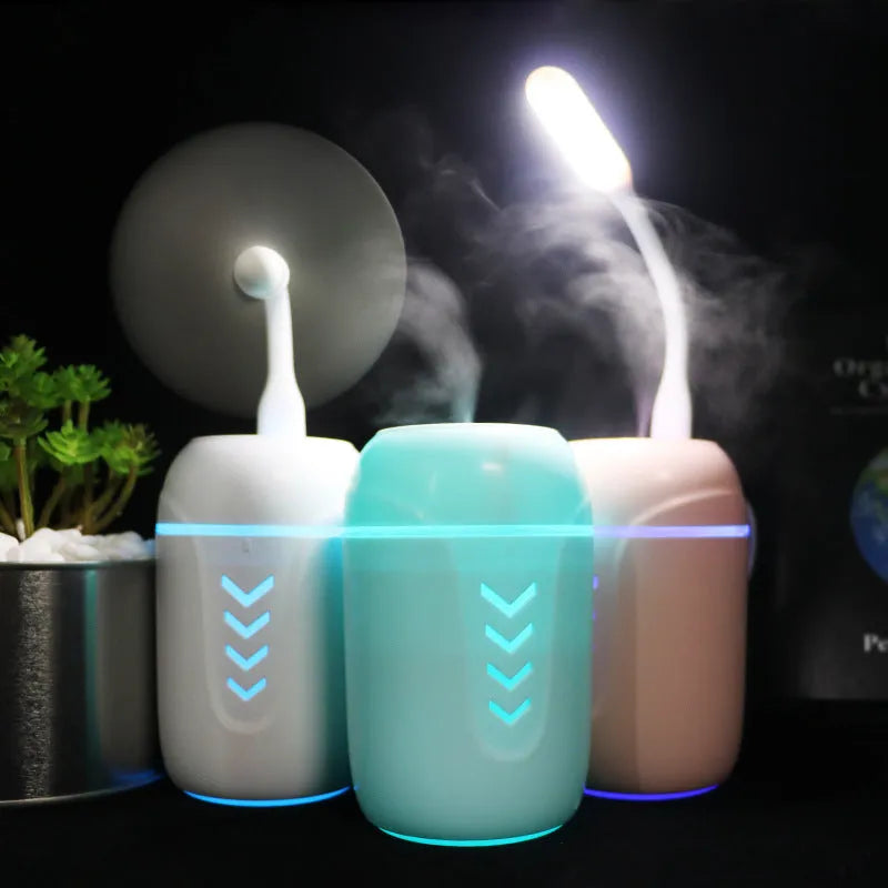 Portable car humidifier with columnar design in blue, pink, or white colour options