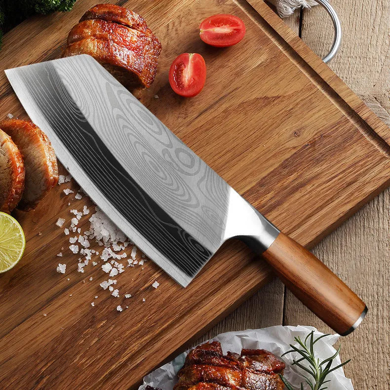 A 320mm long stainless steel kitchen knife with a forged blade on a wooden cutting board.