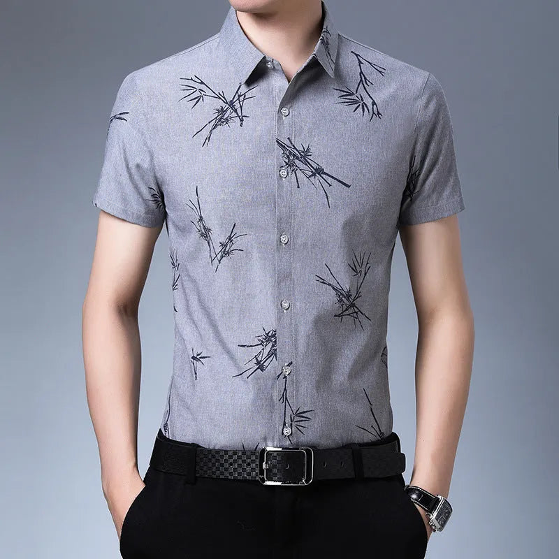 Men's slim fit printed short-sleeve shirt in blue with pointed collar