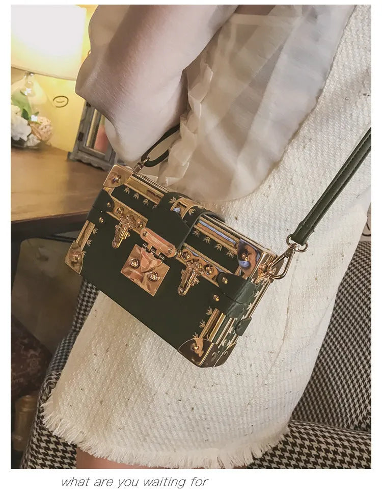 Hard PU leather women's shoulder bag with flap design and crossbody strap in black or green