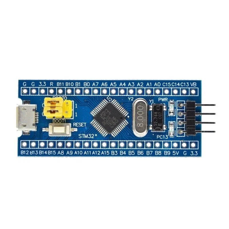 STM32F103C8T6 ARM microcontroller development board with Mini USB connector and pin headers.