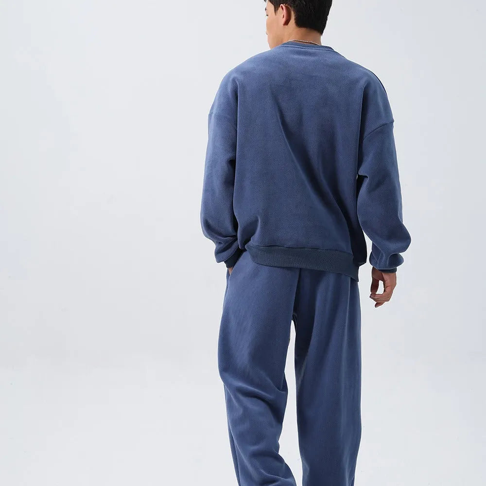 Men's polar fleece sports suit with loose long sleeve coat and matching trousers in winter colours