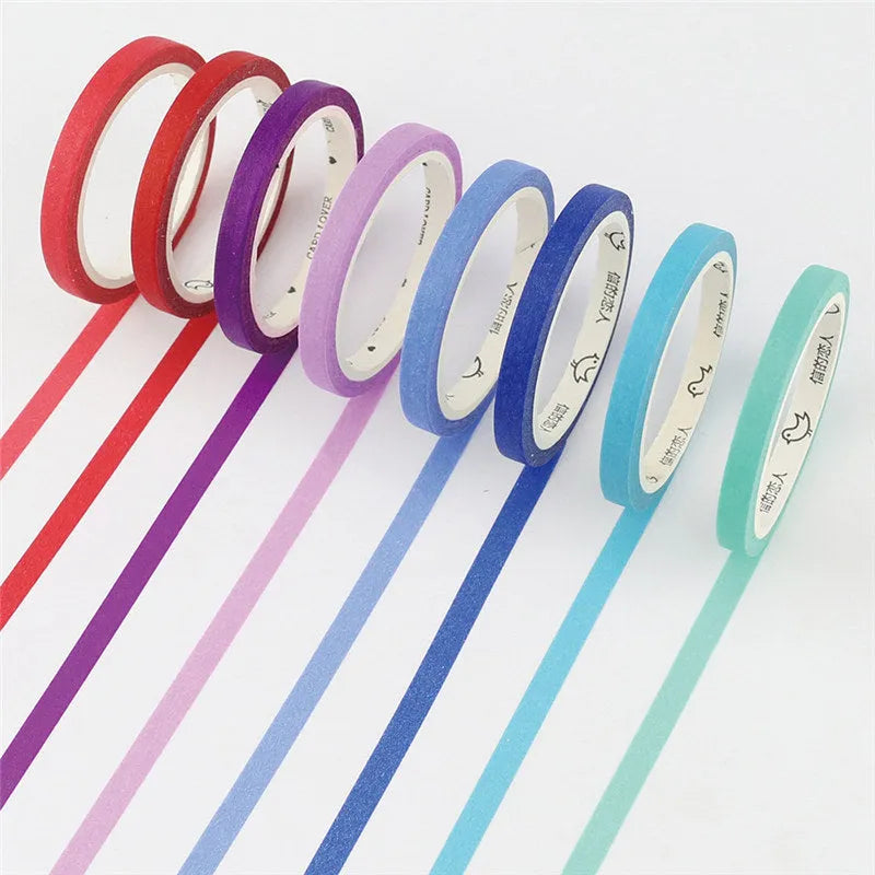 Roll of solid colour paper tape in crimson or deep purple, showing 5mm width stationery tape for organisation