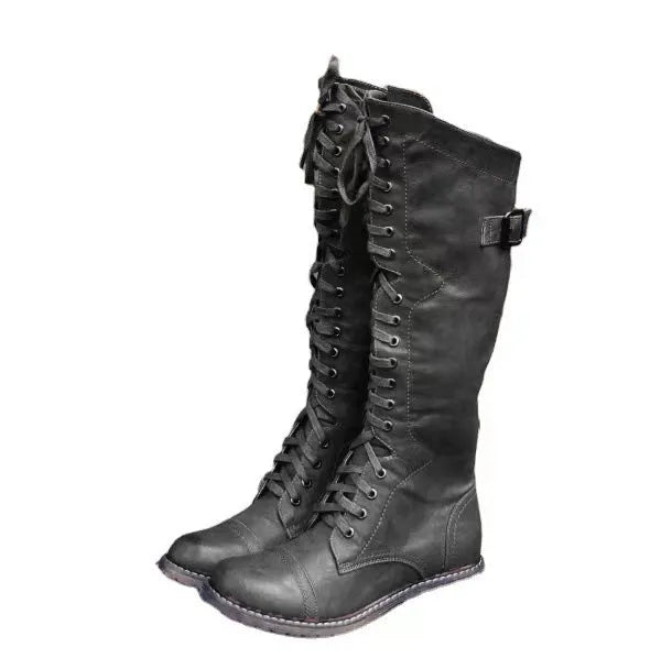 Women's black chunky heel lace-up ankle boots on a white background