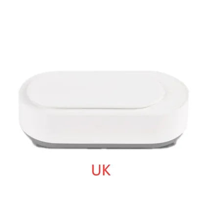 White portable ultrasonic cleaner with stainless steel tank and touch button.