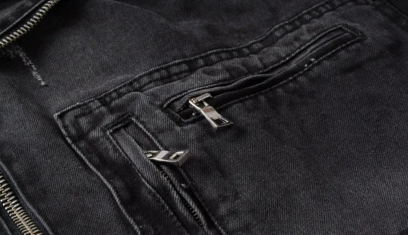 Black slim fit linen denim jacket with zipper front, zipper pockets, and lapel collar on a person