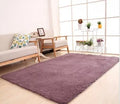 Solid colour fluffy white plush carpet with non-slip dot bottom, shown in a rectangular shape.