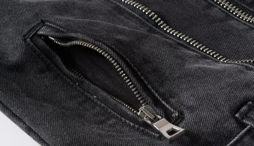 Black slim fit linen denim jacket with zipper front, zipper pockets, and lapel collar on a person