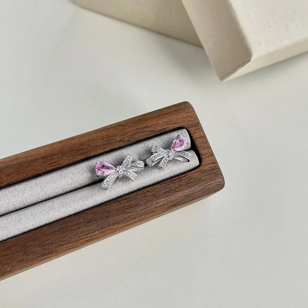S925 sterling silver butterfly earrings with pear-shaped zircon in blue, pink, and platinum colours