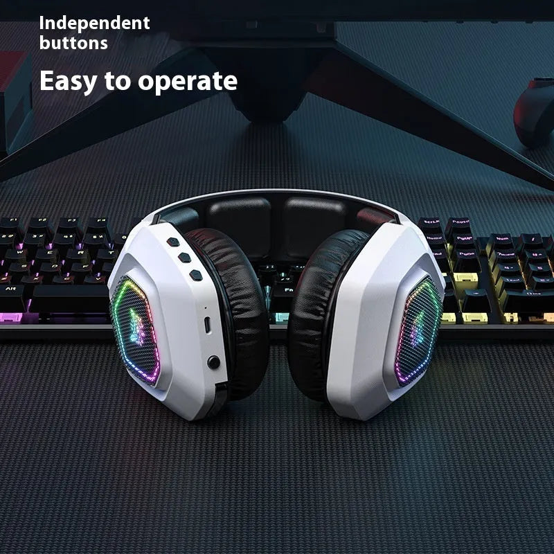 Black and white wireless gaming headset with RGB lights, showing 2.4G receiver and charging cable.