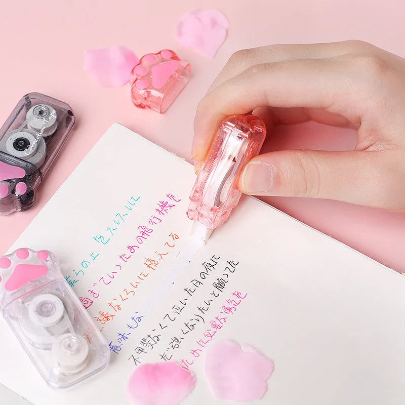 Cat claw correction tape dispenser with 5mm wide PET plastic tape in skyco cat claw bag packaging.