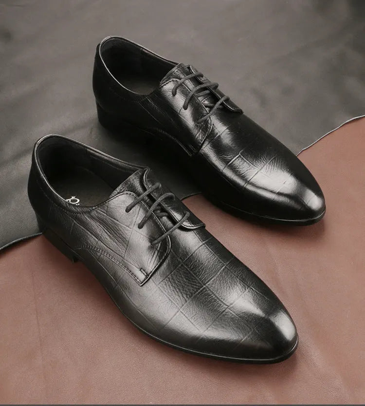 Men's black leather derby shoes with pointed toe and rubber sole