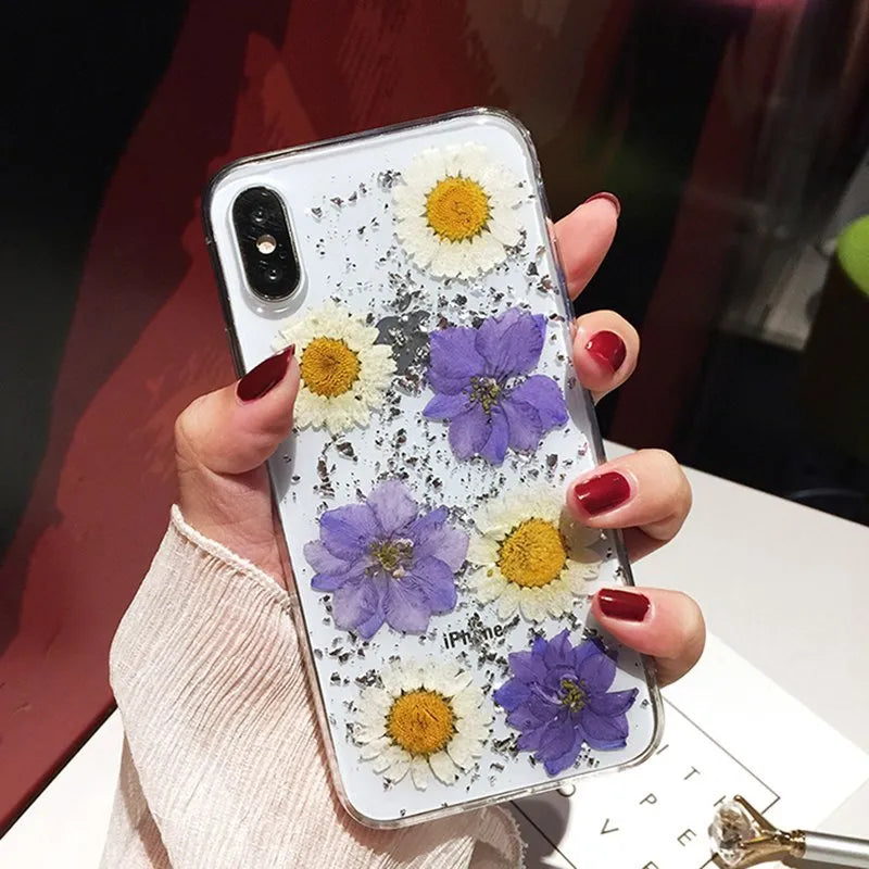 Clear iPhone case with dried flowers in epoxy resin back panel, soft TPU protective cover