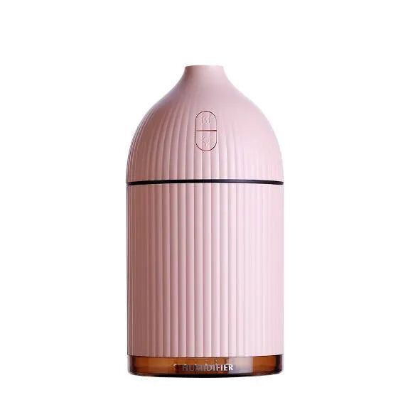 White ultrasonic aromatherapy diffuser with LED light, 300ml water tank, and USB cable.