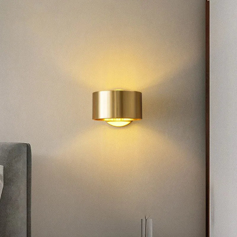 Modern simple style copper wall lamp in gold or black finish for living room.