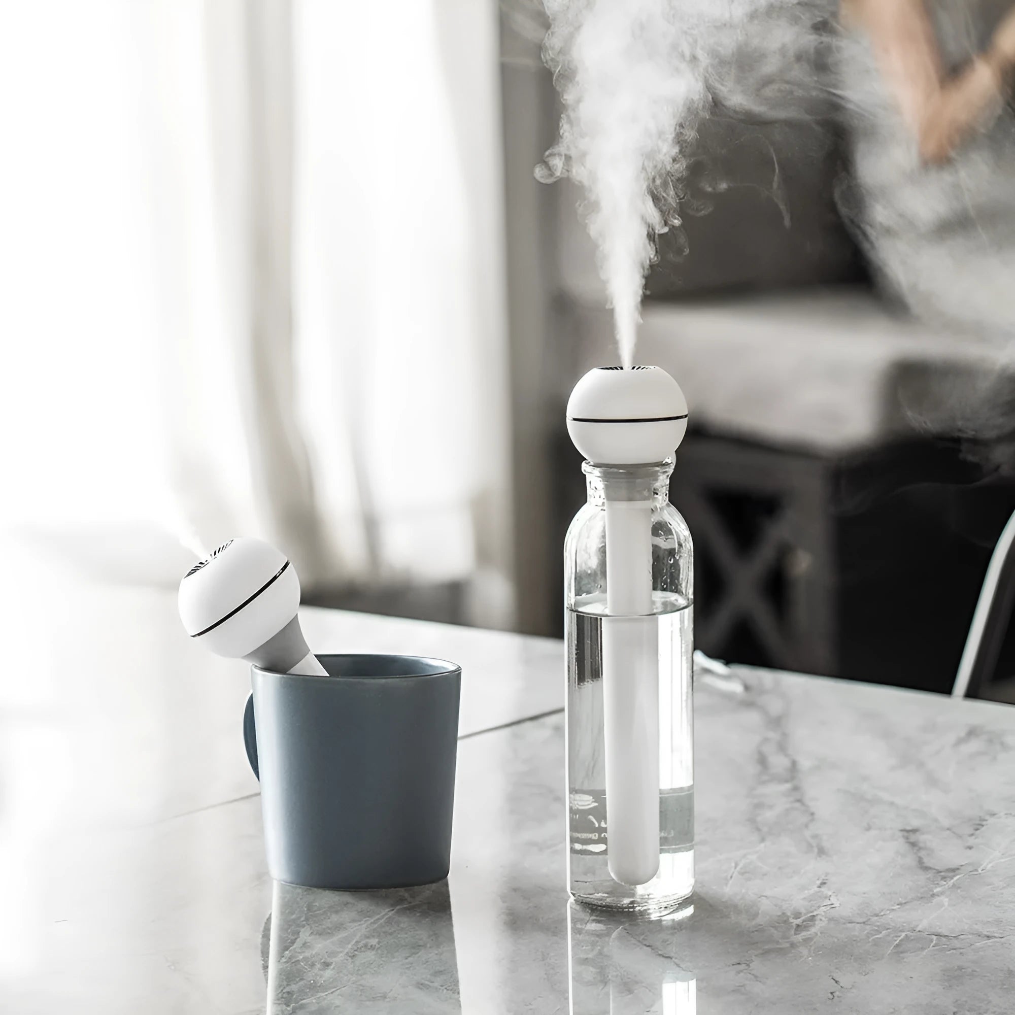 Columnar magic wand humidifier in pink or white colours with USB cable