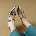 Genuine leather pointed-toe Mary Jane pumps with a chunky mid-heel in gun colour.