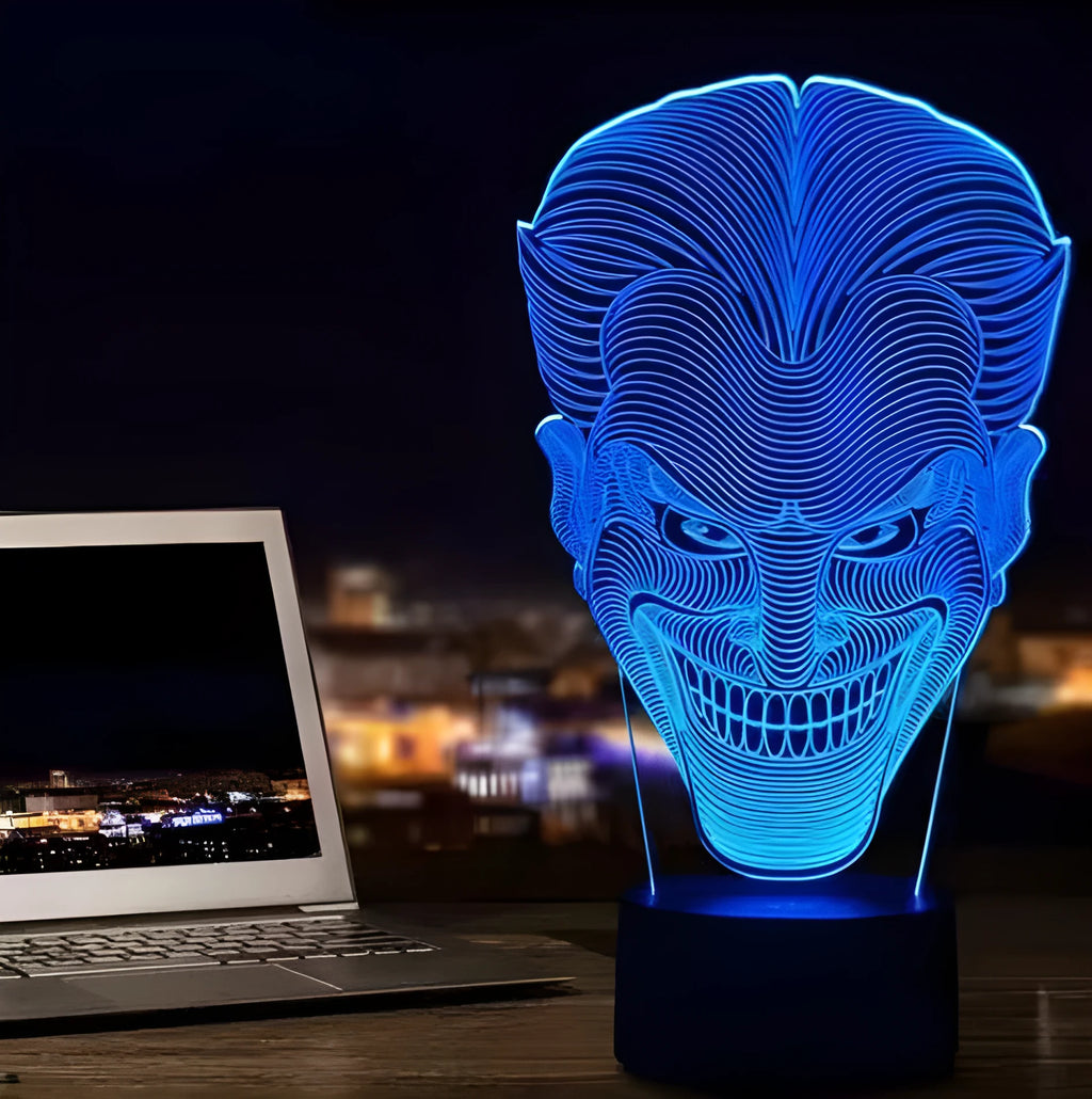 USB-powered 3D acrylic LED lamp displaying multiple colours, shown with its remote control and stand.