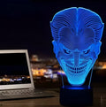 USB-powered 3D acrylic LED lamp displaying multiple colours, shown with its remote control and stand.