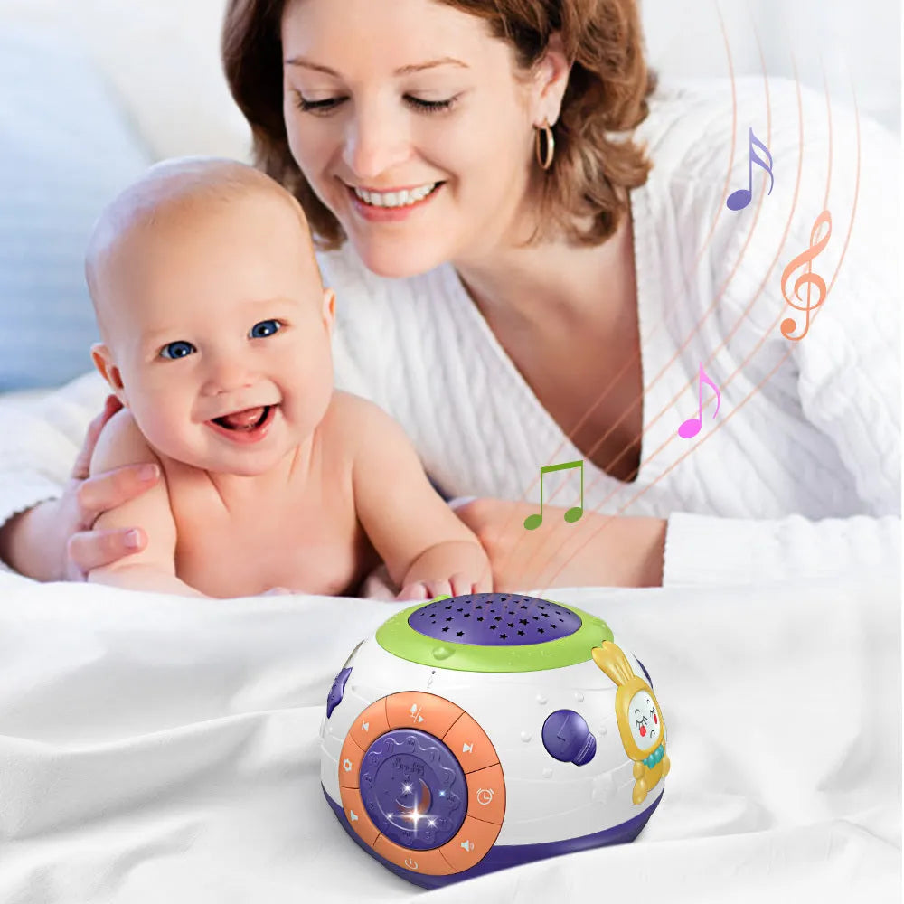 White starry sky night light projector for children on a table, showing colourful light projection.