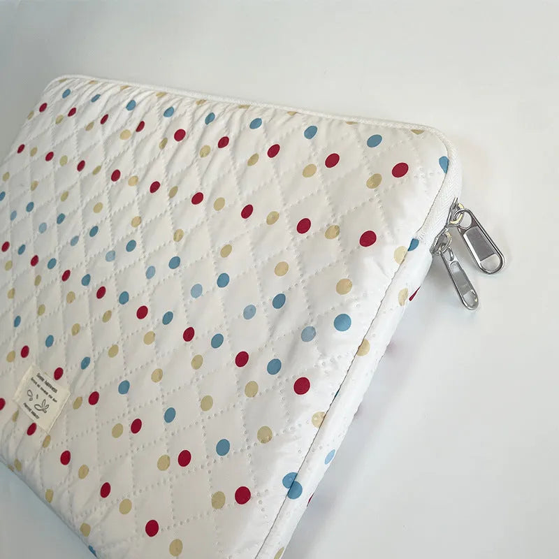 Women's polka dot laptop bag in breathable polyester with size options for computer protection