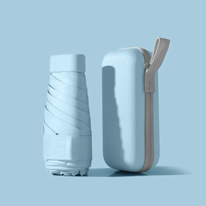 Ultra-light six-fold manual umbrella in sky blue with capsule box