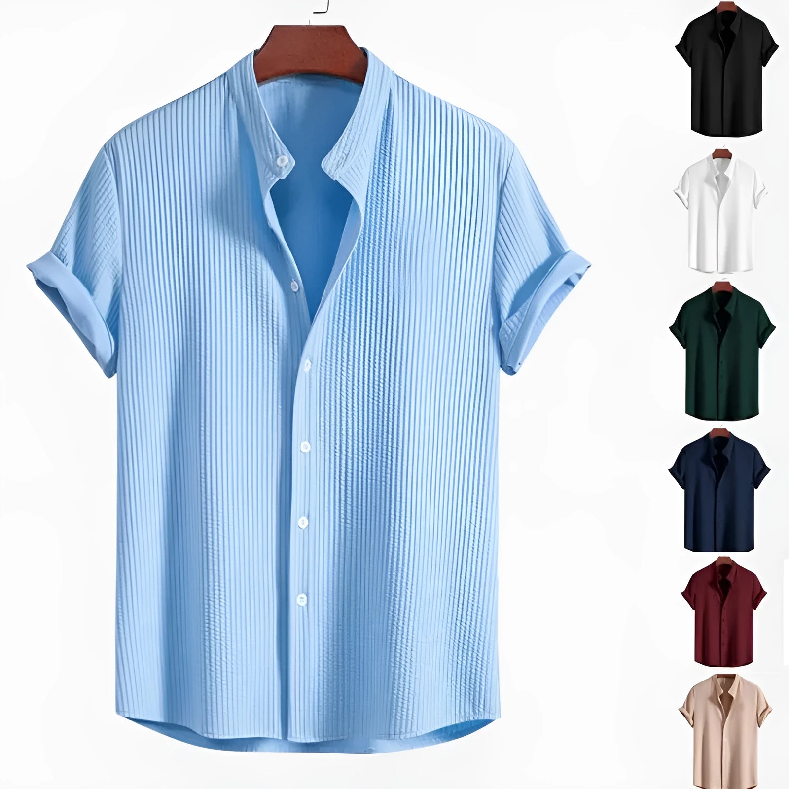 Man wearing a loose-fitting short sleeve casual shirt in a light blue colour.