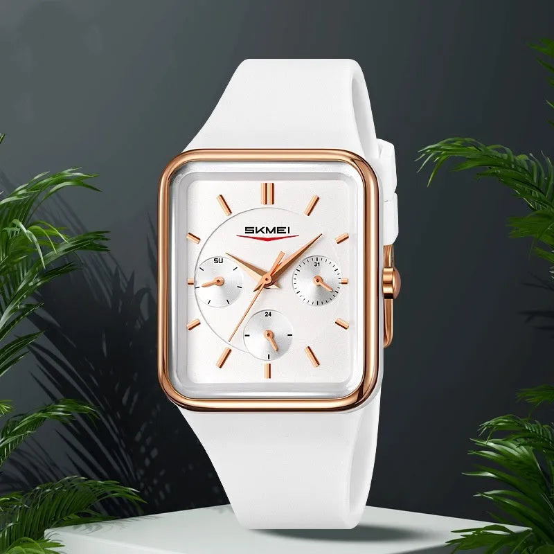 Square silicone waterproof digital watch for girls in multiple colour options on a wrist.