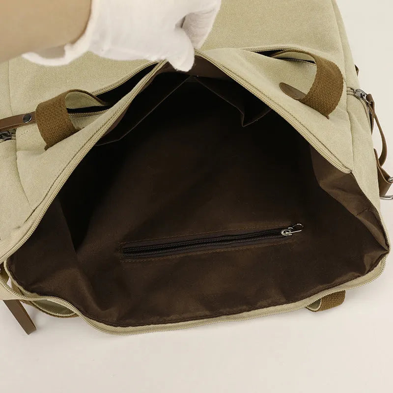 Retro style soft canvas shoulder bag for women in a horizontal square shape with internal organisers.