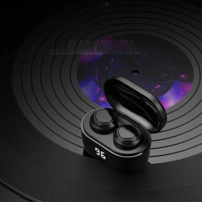 Black wireless stereo Bluetooth over-ear headset with earplug design on a white background.