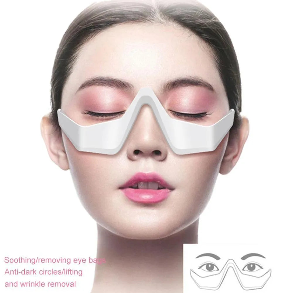 Pink and white micro-current eye massager with glasses-style design