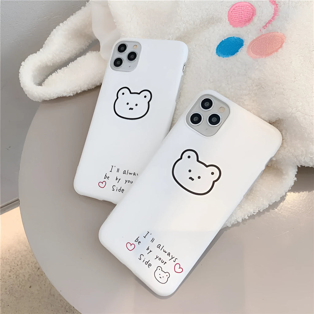 Silicone mobile phone case with a cartoon bear design for Apple iPhone models.