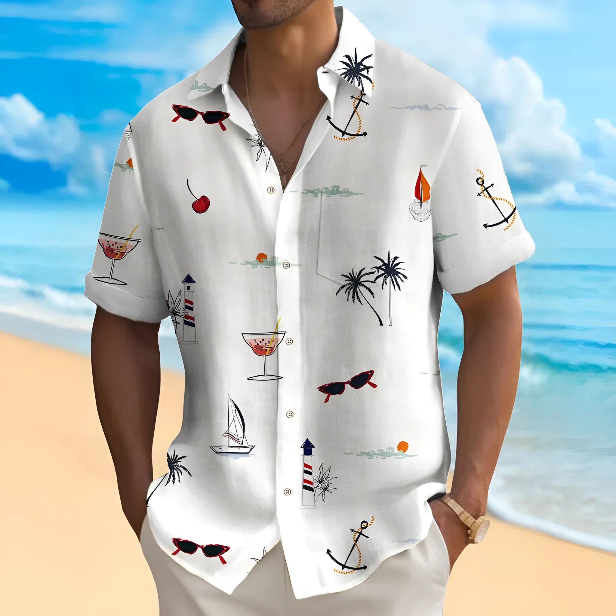 Man wearing a colourful loose-fit Hawaiian print short sleeve shirt on a beach.